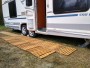 Wooden mat under the swimming pool tent camping